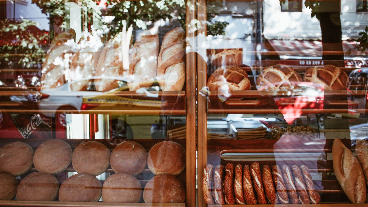 Fresh breads in a bakery display cabinet